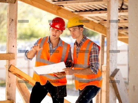 demo-attachment-136-op_two-men-dressed-in-shirts-orange-work-vests-and-KE9JMU2-scaled