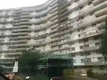 Building exterior before restoration at 71 Thorncliffe Park Drive, East York